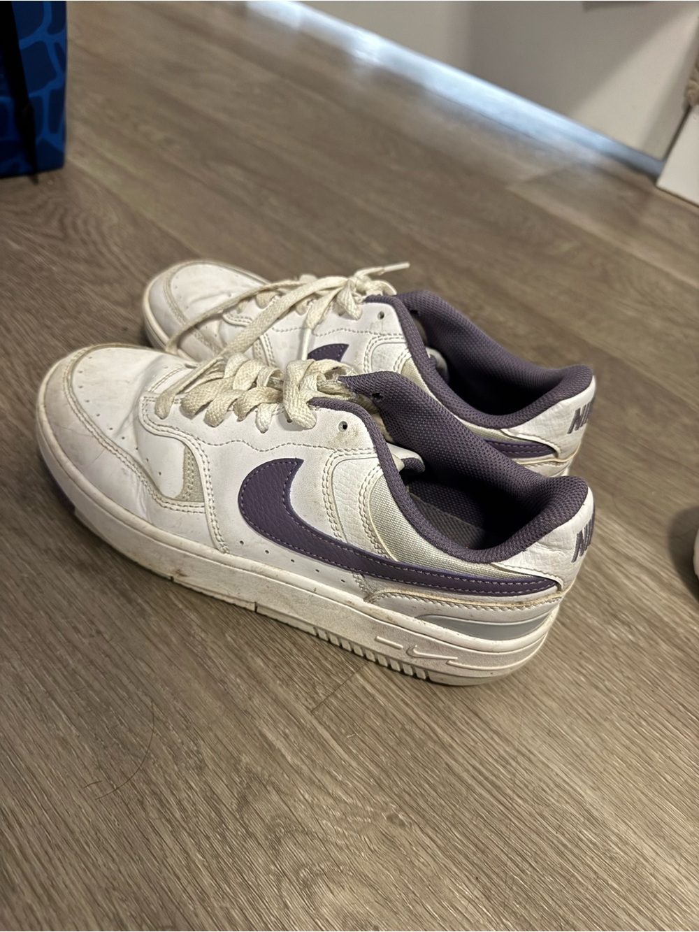Nike White Sneakers with Purple Swoosh